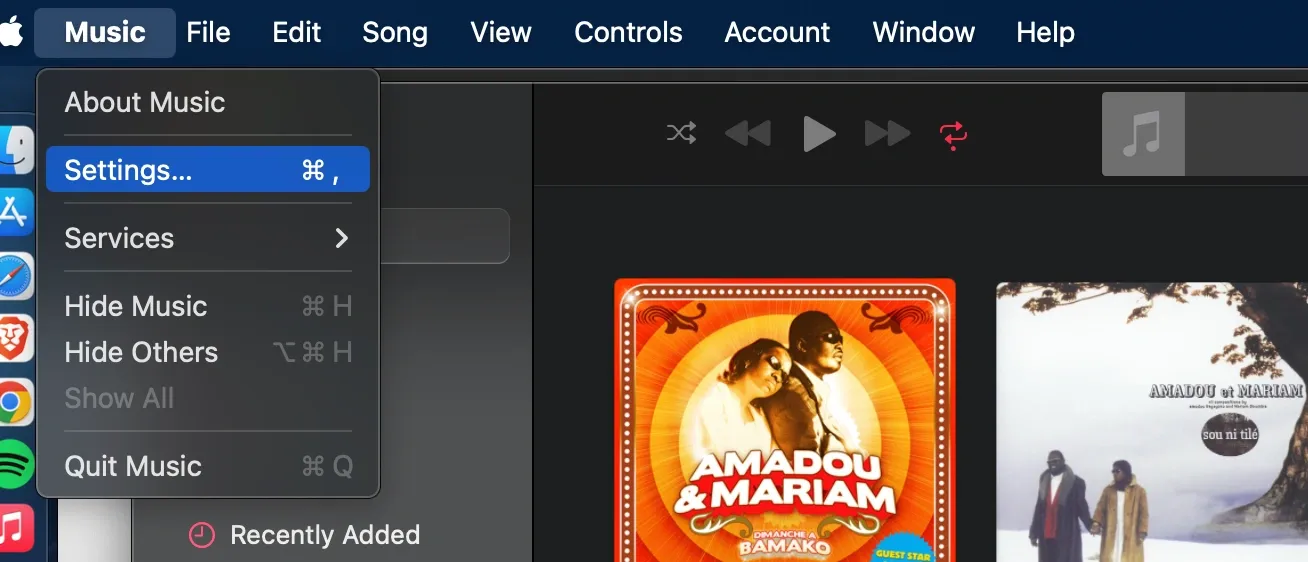 Apple Music settings panel on macOS for adjusting import settings to convert audio files to FLAC or MP3.